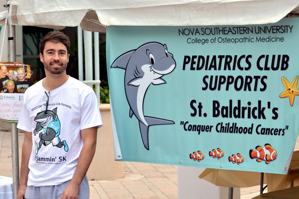 NSU College of Osteopathic Medicine Pediatrics Club banner supporting St. Baldrick's