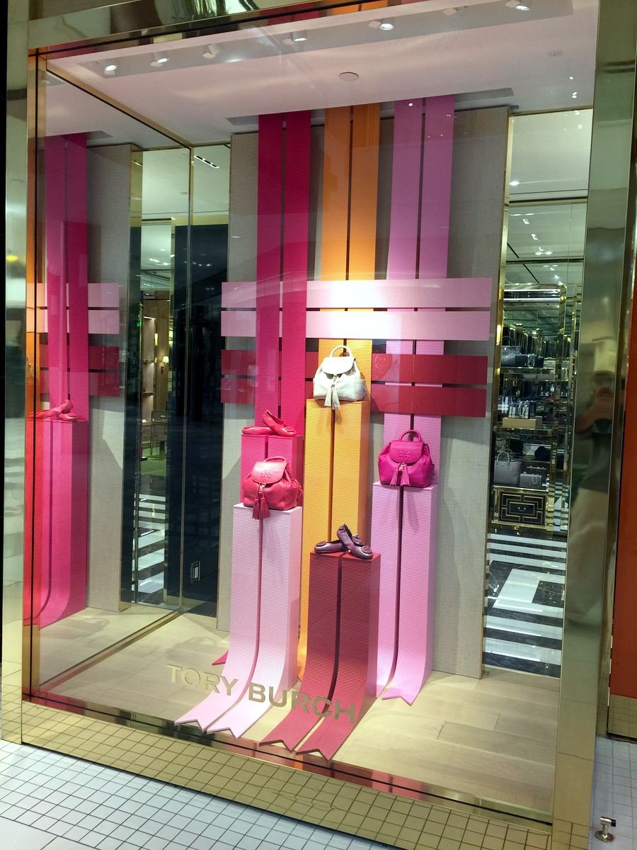 Tory Burch retail window display with ribbon installation