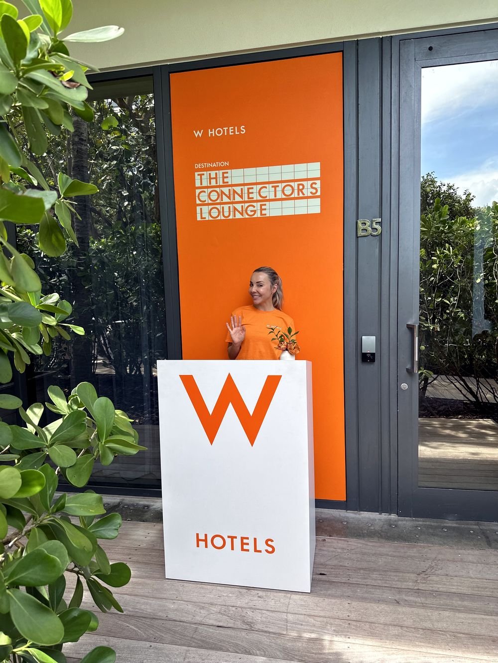 W Hotels Connectors Lounge podium wrap with pop-up entrance branding